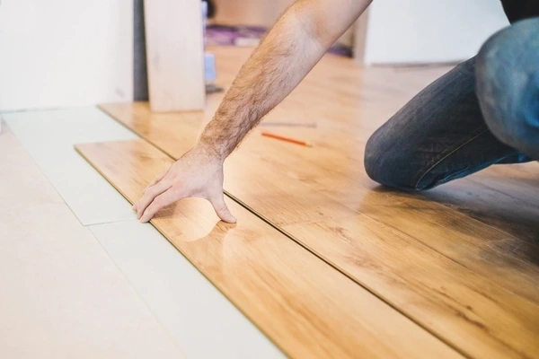 contractor team working on flooring project